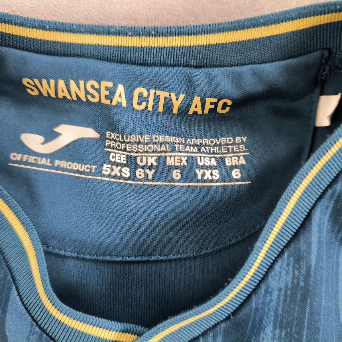 Swansea 2023-24 Joma vendég foci mez gyerek XS-es